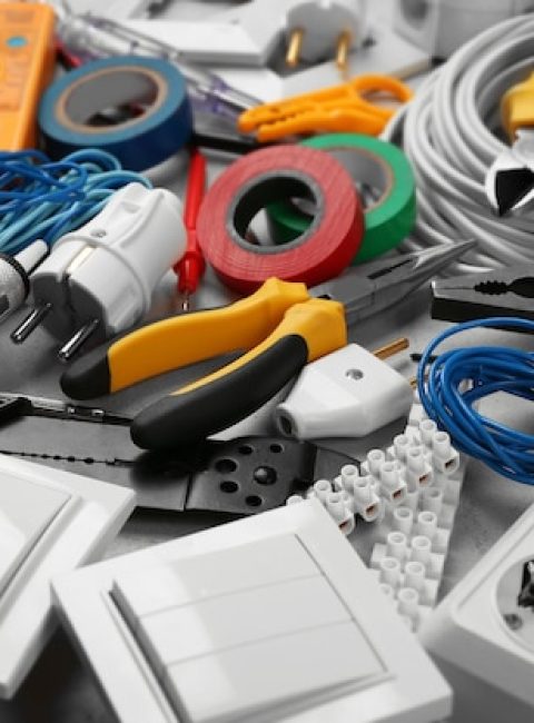 electrician-tools-grey-background-closeup_392895-395832